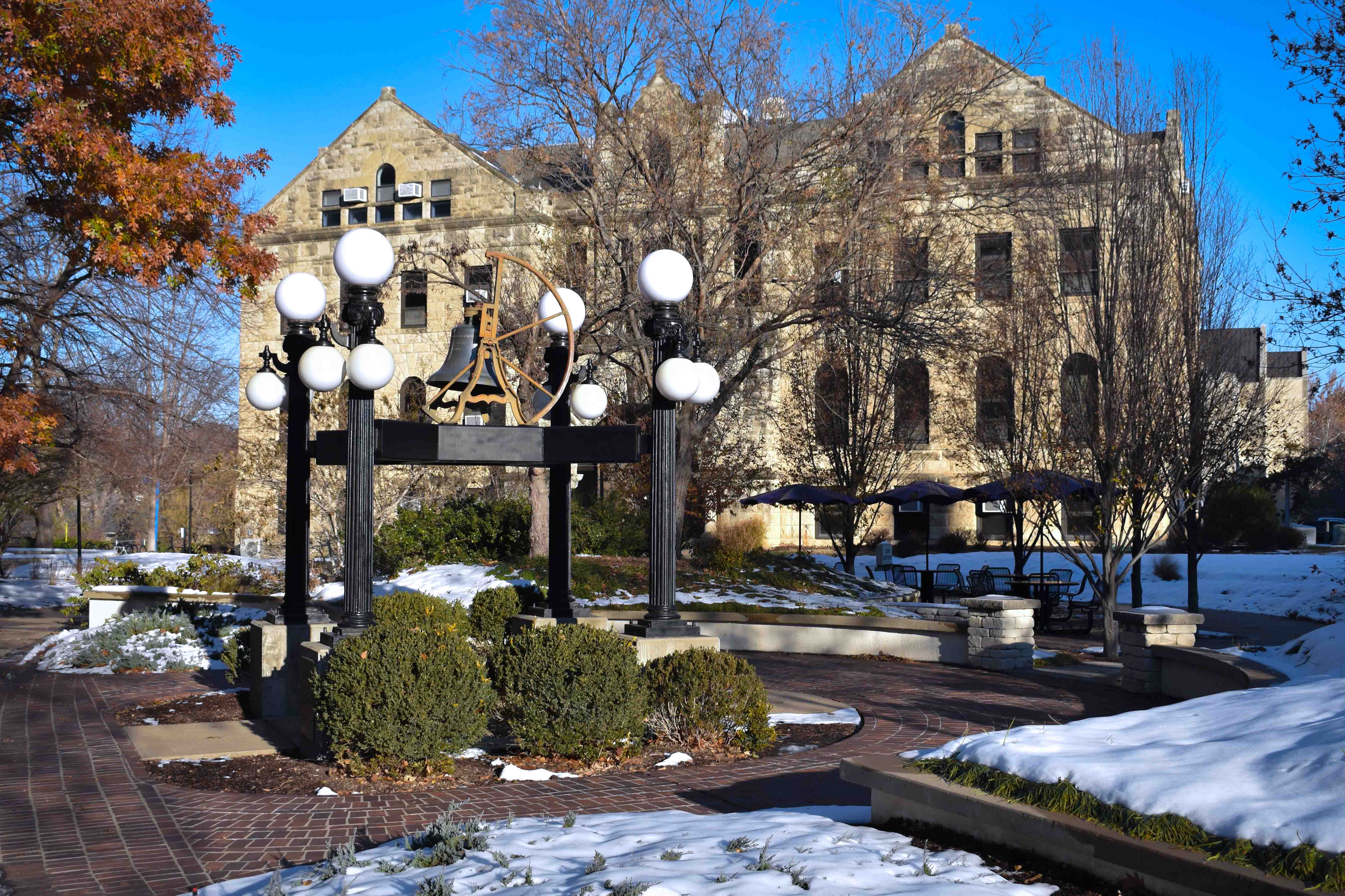 bell in front of Bluemont Hall